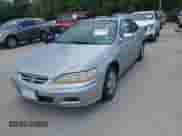 2002 Honda Accord EX with VIN 1HGCG32522A031851, listed as a IAAI auction lot 42598089 with 192,005 mi miles and . Bid and sale history available at DreamBid. Image 2.