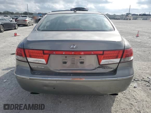2009 Hyundai Azera Limited с VIN KMHFC46FX9A373084, выставлен на аукционе Copart как лот 45532865 с пробегом 107 592 миль миль и Списание • Salvage title. История ставок и продаж доступна на DreamBid. Изображение 6.