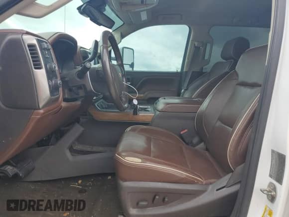 2015 Chevrolet Silverado 3500HD High Country с VIN 1GC4K1E8XFF578192, выставлен на аукционе Copart как лот 82911134 с пробегом 157 795 миль миль и Списание • Salvage title. История ставок и продаж доступна на DreamBid. Изображение 7.