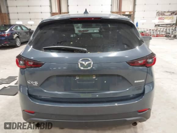 2022 Mazda CX-5 S Preferred z VIN JM3KFBCM1N0551165, wystawiony jako IAAI lot #42277023 z przebiegiem 34 115 mil mil oraz . Historia ofert i sprzedaży dostępna na DreamBid. Obrazek 15.