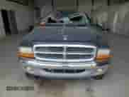 2003 Dodge Dakota SLT z VIN 1D7HG48N63S296100, wystawiony jako Copart lot #68014165 z przebiegiem Nie podano mil oraz Szkoda całkowita • Salvage title. Historia ofert i sprzedaży dostępna na DreamBid. Obrazek 5.