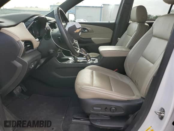 2022 Chevrolet Traverse Premier с VIN 1GNERKKW0NJ182428, выставлен на аукционе Copart как лот 57123605 с пробегом 62 224 миль миль и Списание • Salvage title. История ставок и продаж доступна на DreamBid. Изображение 7.