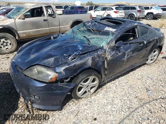 2006 Hyundai Tiburon GT с VIN KMHHN65FX6U191069, выставлен на аукционе Copart как лот 68652734 с пробегом Не указан миль и Чистый • Clean title. История ставок и продаж доступна на DreamBid. Изображение 1.