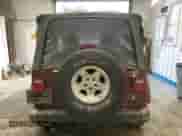 2001 Jeep Wrangler Sahara z VIN 1J4FA59S11P334534, wystawiony jako Copart lot #90651005 z przebiegiem 155 822 mil mil oraz Czysty tytuł • Clean title. Historia ofert i sprzedaży dostępna na DreamBid. Obrazek 6.