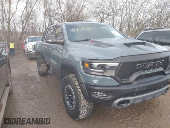 2021 Ram 1500 TRX with VIN 1C6SRFU97MN900193, listed as a IAAI auction lot 41050735 with 58,323 mi miles and . Bid and sale history available at DreamBid. Image 1.