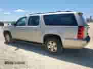 2009 Chevrolet Suburban 2LT with VIN 1GNFC26J39R182886, listed as a Copart auction lot 63503335 with 215,162 mi miles and Clean title. Bid and sale history available at DreamBid. Image 2.