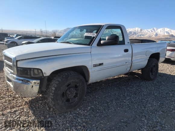 2001 Dodge RAM with VIN 3B7KC26601M283456, listed as a Copart auction lot 41870155 with 243,191 mi miles and Salvage title. Bid and sale history available at DreamBid. Image 1.