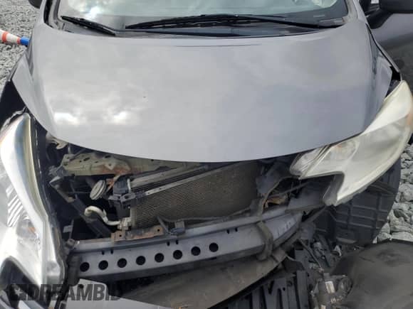 2016 Nissan Note SV z VIN 3N1CE2CP9GL397744, wystawiony jako Copart lot #70173585 z przebiegiem 115 340 mil mil oraz Szkoda całkowita • Salvage title. Historia ofert i sprzedaży dostępna na DreamBid. Obrazek 11.