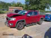 2015 Chevrolet Colorado 4WD LT z VIN 1GCGTBE31F1184744, wystawiony jako IAAI lot #42988122 z przebiegiem 122 987 mil mil oraz . Historia ofert i sprzedaży dostępna na DreamBid. Obrazek 2.