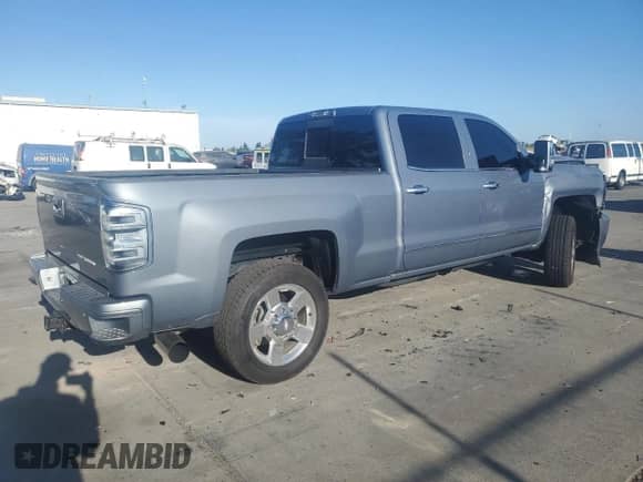 2016 Chevrolet Silverado 2500HD LTZ with VIN 1GC1KWE89GF212001, listed as a Copart auction lot 71680865 with 106,260 mi miles and Salvage title. Bid and sale history available at DreamBid. Image 3.