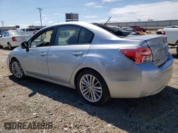2013 Subaru Impreza Premium with VIN JF1GJAD69DH018171, listed as a Copart auction lot 71448975 with 80,970 mi miles and Salvage title. Bid and sale history available at DreamBid. Image 2.