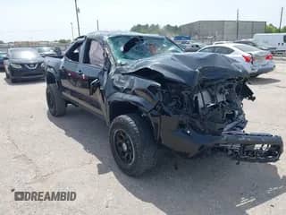 2024 Toyota Tacoma SR with VIN 3TYKD5HN6RT017734, listed as a IAAI auction lot 42870572 with Not provided miles and . Bid and sale history available at DreamBid. Image 1.