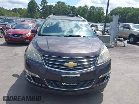 2015 Chevrolet Traverse LT z VIN 1GNKRGKDXFJ293455, wystawiony jako IAAI lot #43009199 z przebiegiem Nie podano mil oraz . Historia ofert i sprzedaży dostępna na DreamBid. Obrazek 12.