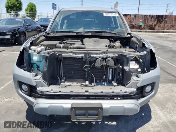 2021 Toyota Tacoma SR5 с VIN 3TMBZ5DNXMM031339, выставлен на аукционе Copart как лот 59178515 с пробегом 27 885 миль миль и Списание • Salvage title. История ставок и продаж доступна на DreamBid. Изображение 5.