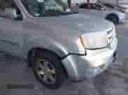 2009 Honda Pilot Touring with VIN 5FNYF48929B004092, listed as a IAAI auction lot 43116551 with 232,447 mi miles and . Bid and sale history available at DreamBid. Image 6.