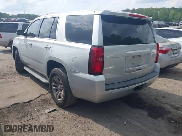 2015 Chevrolet Tahoe Commercial with VIN 1GNLC2EC5FR534173, listed as a IAAI auction lot 42127196 with 150,568 mi miles and . Bid and sale history available at DreamBid. Image 3.