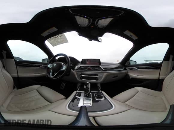 2019 BMW 7 Series 750i z VIN WBA7F0C50KGM26010, wystawiony jako IAAI lot #42188421 z przebiegiem 71 576 mil mil oraz . Historia ofert i sprzedaży dostępna na DreamBid. Obrazek 19.