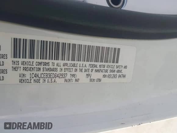 2014 Jeep Compass Latitude with VIN 1C4NJCEB3ED642937, listed as a IAAI auction lot 43228516 with Not provided miles and . Bid and sale history available at DreamBid. Image 9.
