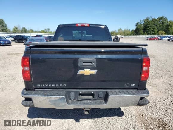2016 Chevrolet Silverado 1500 LT with VIN 1GCVKRECXGZ385371, listed as a Copart auction lot 71149615 with 113,199 mi miles and Salvage title. Bid and sale history available at DreamBid. Image 6.