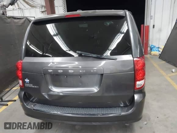 2018 Dodge Grand Caravan SE with VIN 2C4RDGBG8JR303954, listed as a IAAI auction lot 42385878 with 70,320 mi miles and . Bid and sale history available at DreamBid. Image 17.