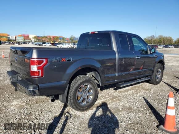 2018 Ford F-150 XL с VIN 1FTFX1E51JFB83200, выставлен на аукционе Copart как лот 86768915 с пробегом 99 682 миль миль и Списание • Salvage title. История ставок и продаж доступна на DreamBid. Изображение 3.