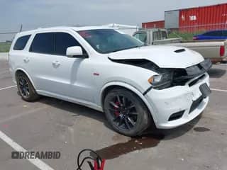2018 Dodge Durango SRT with VIN 1C4SDJGJ2JC434843, listed as a IAAI auction lot 42434327 with 144,483 mi miles and . Bid and sale history available at DreamBid. Image 1.