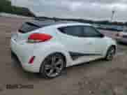 2013 Hyundai Veloster w/Black Int z VIN KMHTC6AD6DU145921, wystawiony jako Copart lot #68556835 z przebiegiem 91 117 mil mil oraz Szkoda całkowita • Salvage title. Historia ofert i sprzedaży dostępna na DreamBid. Obrazek 3.