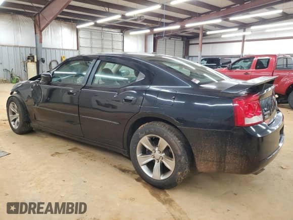 2010 Dodge Charger R/T с VIN 2B3CK5CT0AH144107, выставлен на аукционе Copart как лот 47945765 с пробегом 153 444 миль миль и Списание • Salvage title. История ставок и продаж доступна на DreamBid. Изображение 2.