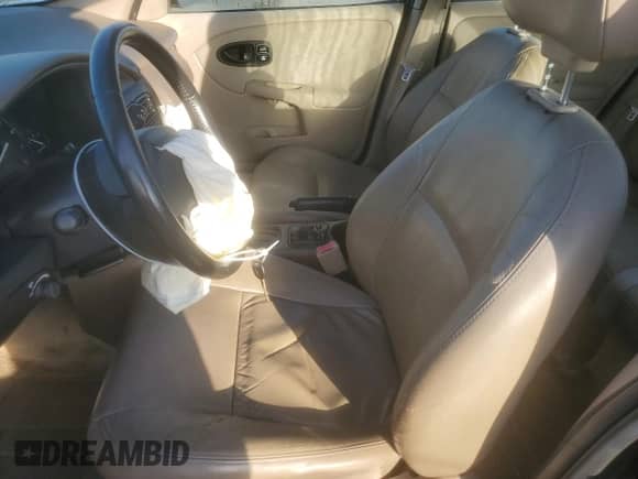2001 Saturn SL with VIN 1G8ZK52741Z336816, listed as a Copart auction lot 46798005 with 153,642 mi miles and Salvage title. Bid and sale history available at DreamBid. Image 7.
