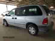 2000 Dodge Caravan with VIN 2B4GP25GXYR896821, listed as a Copart auction lot 58079985 with 217,327 mi miles and Salvage title. Bid and sale history available at DreamBid. Image 2.