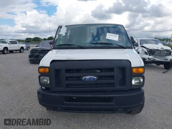 2013 Ford Econoline Cargo Commercial with VIN 1FTNE2EW1DDB21585, listed as a IAAI auction lot 42107682 with 266,895 mi miles and . Bid and sale history available at DreamBid. Image 12.