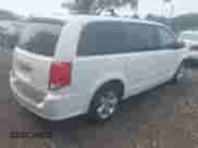 2013 Dodge Grand Caravan SE with VIN 2C4RDGBG1DR517088, listed as a IAAI auction lot 42913307 with 170,913 mi miles and . Bid and sale history available at DreamBid. Image 4.