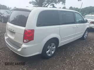 2013 Dodge Grand Caravan SE with VIN 2C4RDGBG1DR517088, listed as a IAAI auction lot 42913307 with 170,913 mi miles and . Bid and sale history available at DreamBid. Image 4.