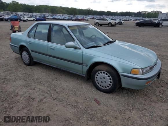 1992 Honda Accord с VIN 1HGCB7654NA067531, выставлен на аукционе Copart как лот 53514095 с пробегом 82 661 миль миль и Чистый • Clean title. История ставок и продаж доступна на DreamBid. Изображение 4.