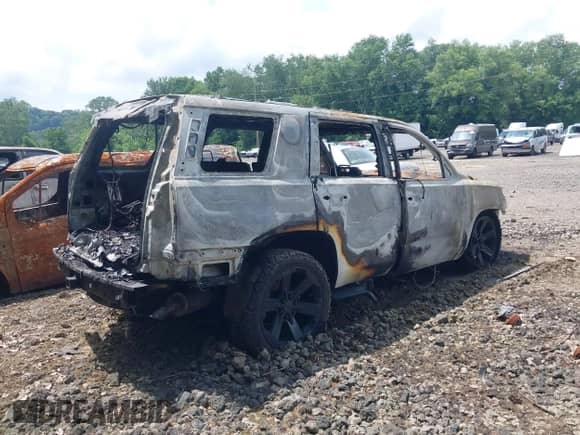 2019 Chevrolet Tahoe LS with VIN 1GNSKAKC0KR341436, listed as a IAAI auction lot 42749185 with Not provided miles and . Bid and sale history available at DreamBid. Image 4.