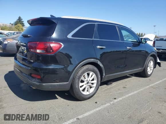 2019 Kia Sorento L z VIN 5XYPG4A33KG542099, wystawiony jako Copart lot #82069815 z przebiegiem 134 920 mil mil oraz Czysty tytuł • Clean title. Historia ofert i sprzedaży dostępna na DreamBid. Obrazek 3.