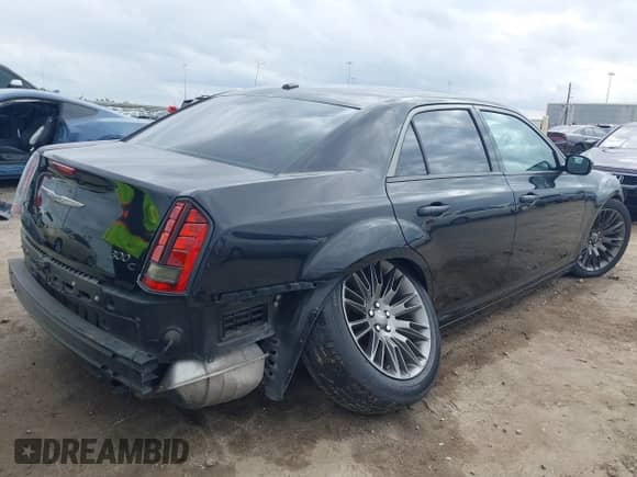 2013 Chrysler 300 C John Varvatos Limited Edition with VIN 2C3CCADG2DH698344, listed as a IAAI auction lot 41480379 with 166,423 mi miles and . Bid and sale history available at DreamBid. Image 4.