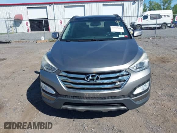 2014 Hyundai Santa Fe with VIN 5XYZWDLA0EG135854, listed as a IAAI auction lot 42995069 with 140,135 mi miles and . Bid and sale history available at DreamBid. Image 12.