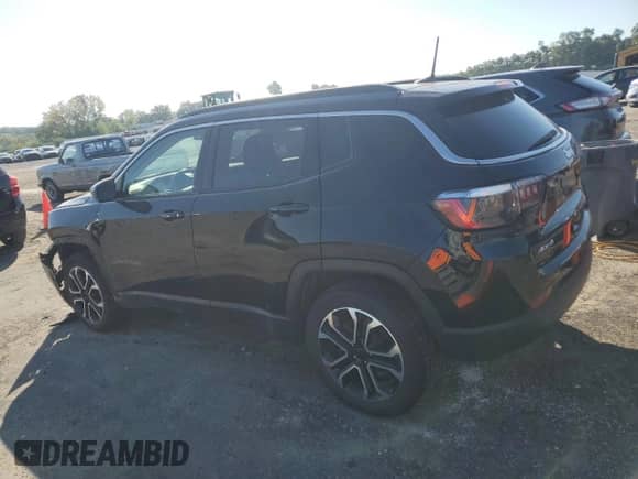 2022 Jeep Compass Limited with VIN 3C4NJDCB4NT205810, listed as a Copart auction lot 81872195 with 57,015 mi miles and Salvage title. Bid and sale history available at DreamBid. Image 2.