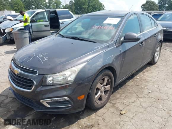 2015 Chevrolet Cruze LT with VIN 1G1PC5SB7F7232735, listed as a IAAI auction lot 43015393 with 154,308 mi miles and . Bid and sale history available at DreamBid. Image 2.