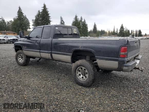 1998 Dodge 2500 with VIN 1B7KF2367WJ207684, listed as a Copart auction lot 85359924 with 284,031 mi miles and Salvage title. Bid and sale history available at DreamBid. Image 2.