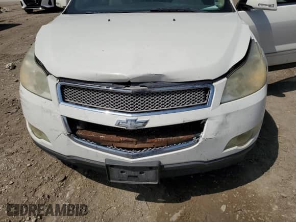 2012 Chevrolet Traverse LTZ with VIN 1GNKRLED0CJ408001, listed as a Copart auction lot 69318945 with 120,744 mi miles and Salvage title. Bid and sale history available at DreamBid. Image 12.
