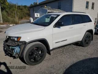 2018 Jeep Grand Cherokee Altitude with VIN 1C4RJFAG7JC466219, listed as a Copart auction lot 82203355 with 101,784 mi miles and Salvage title. Bid and sale history available at DreamBid. Image 1.