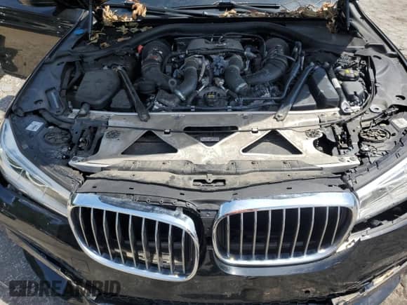 2016 BMW 7 Series 750i xDrive с VIN WBA7F2C58GG420362, выставлен на аукционе Copart как лот 69682485 с пробегом 79 928 миль миль и Списание • Salvage title. История ставок и продаж доступна на DreamBid. Изображение 11.