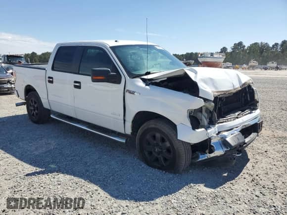 2013 Ford F-150 XLT с VIN 1FTFW1ET8DFA50018, выставлен на аукционе Copart как лот 80842835 с пробегом 241 595 миль миль и Списание • Salvage title. История ставок и продаж доступна на DreamBid. Изображение 4.