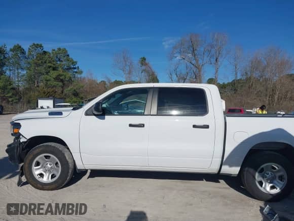 2023 Ram 1500 Tradesman z VIN 1C6SRFGT4PN652688, wystawiony jako IAAI lot #41714908 z przebiegiem 18 798 mil mil oraz . Historia ofert i sprzedaży dostępna na DreamBid. Obrazek 14.