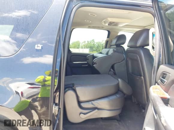 2013 Chevrolet Suburban LT with VIN 1GNSKJE71DR168382, listed as a IAAI auction lot 42821206 with 209,210 mi miles and . Bid and sale history available at DreamBid. Image 8.