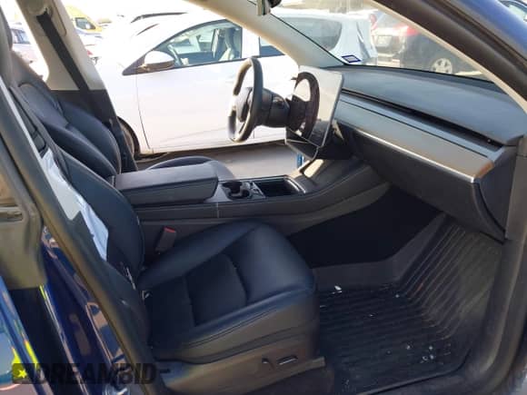 2022 Tesla Model Y Long Range z VIN 7SAYGDEE9NF443673, wystawiony jako IAAI lot #42878246 z przebiegiem 65 689 mil mil oraz . Historia ofert i sprzedaży dostępna na DreamBid. Obrazek 5.