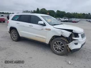 2014 Jeep Grand Cherokee Limited with VIN 1C4RJFBG5EC567201, listed as a IAAI auction lot 43339613 with 180,551 mi miles and . Bid and sale history available at DreamBid. Image 1.