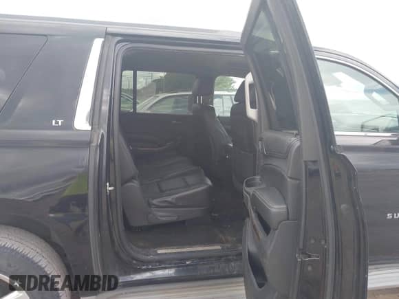 2015 Chevrolet Suburban LT with VIN 1GNSCJKC1FR545648, listed as a IAAI auction lot 42982512 with 405,947 mi miles and . Bid and sale history available at DreamBid. Image 8.